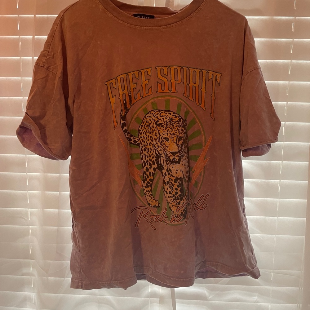 purple tiger shirt with folded sleeves